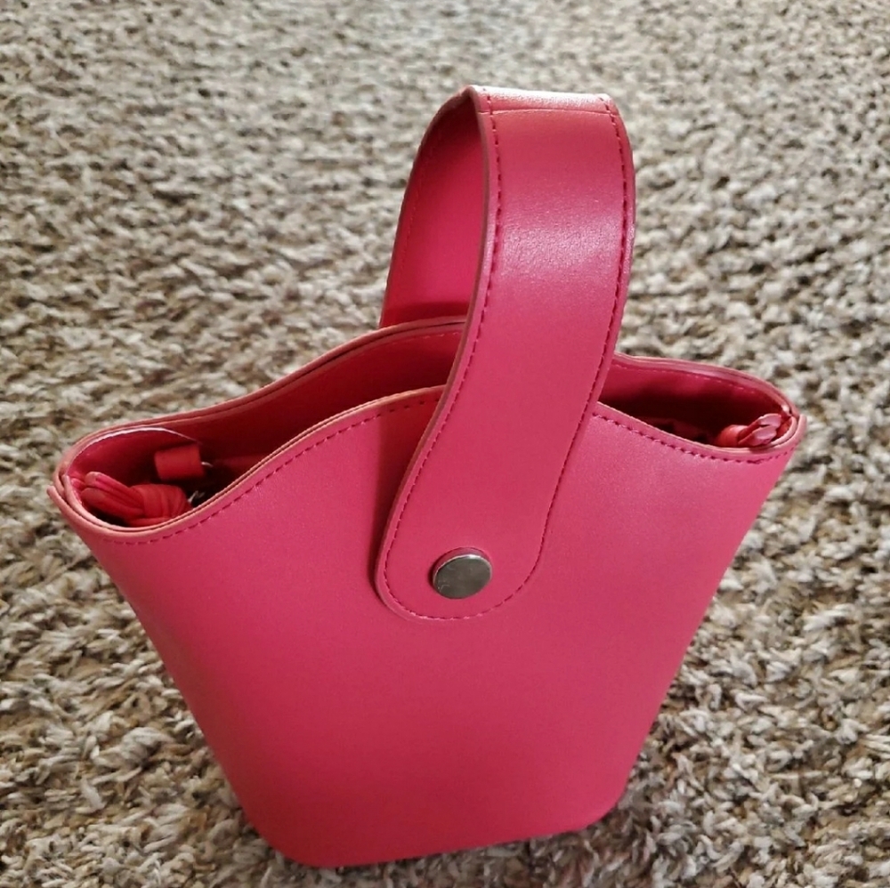 Dark pink handbag